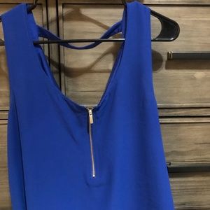 Sleeveless open back tunic
